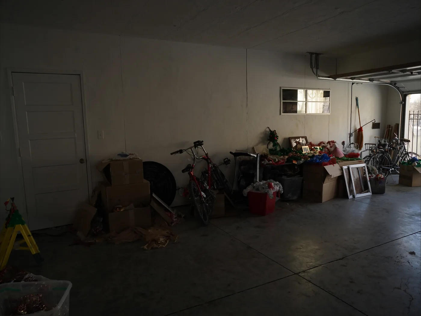 Cluttered garage before a Reset My Garage visit
