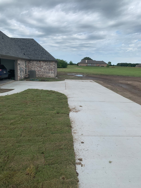 Sod job completed in the front yard with bermuda grass